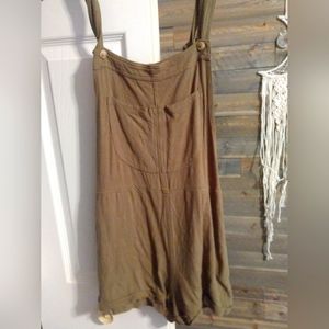 Green romper from altered state